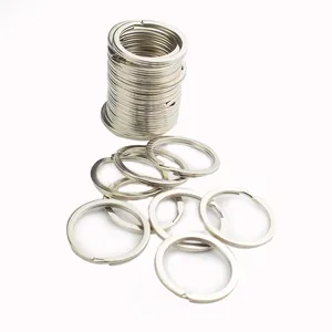 Stack of durable flat metal key rings in polished silver finish for DIY accessories