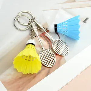 Creative badminton racket keychain set with silver rackets and colorful shuttlecocks