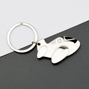 Polished silver metal airplane keychain with a minimalist 3D aircraft model design