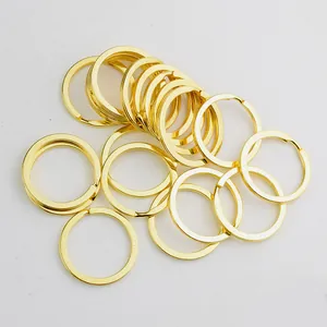 Flat 32mm golden metal keyrings set with double-loop spiral design for jewelry making