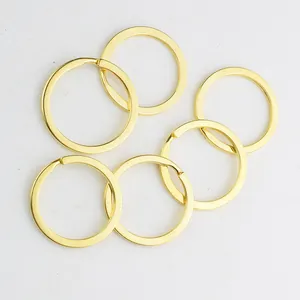 Top view of six premium gold plated 32mm metal split key rings for DIY crafts