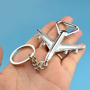 Zinc alloy airplane keychain with integrated beer bottle opener in polished silver finish
