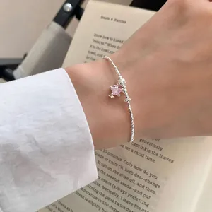 Élégant bracelet en argent S925 avec perles et pendentif étoile en zircon rose au poignet