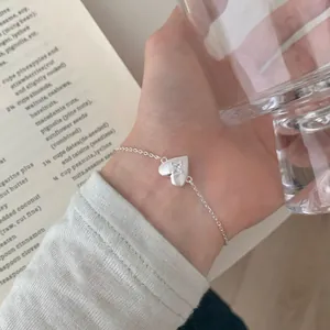 Elegant S925 sterling silver heart bracelet with colorful cubic zirconia and matte finish