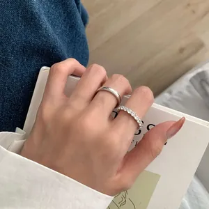 Minimalist S925 sterling silver eternity ring set with sparkling cubic zirconia accents