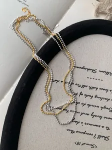 Close-up of S925 sterling silver bead chain with lobster clasp and adjustable extension