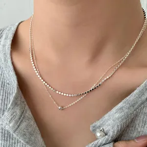 Collana a doppio strato in argento S925 minimalista con perline e dischi sul collo