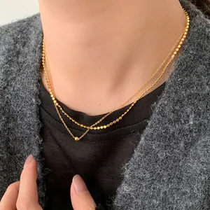 Collana a doppio strato in argento S925 con perle lucide e ciondoli a disco piatti
