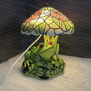 Detailed close-up of a Frog and Flower Stained Glass Lamp with mushroom-shaped lampshade