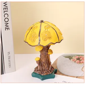 Close-up of mushroom resin ornament with floral carving and star-shaped base