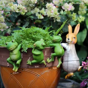 Detailed garden decor ornaments featuring cute resin frogs and rabbit climbing flower pots