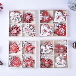 Set of red and white wooden Christmas ornaments with stars, bells, and trees in wooden boxes