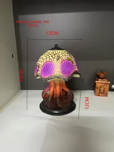 Dimensiones detalladas que muestran 15cm de altura y 355g de peso de la lámpara medusa