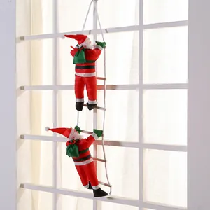 Christmas ornament featuring two Santa Claus figures climbing a white rope ladder decor