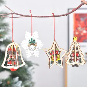 3D hollow wooden Christmas ornaments with festive patterns hanging on a tree branch