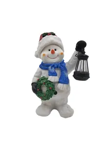 Miniatur Schneemann Figur aus Harz mit roter Mütze und Laterne für Weihnachtsdeko