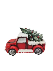 Vintage red Christmas truck figurine with snowy resin roof and a miniature Xmas tree
