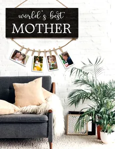 Detail of world's best MOTHER wood photo display plaque with mini clips on white brick wall