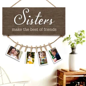 Rustic wood photo display frame with Sisters text and hanging clips for wall decor