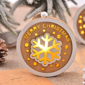 Lighted wooden Merry Christmas round hanging ornament with LED snowflake hollow design
