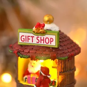Miniature Christmas resin gift shop house with warm LED lights and Santa Claus figure
