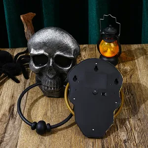 Halloween skull doorbell with light and sound effects, front and back view of hanging prop