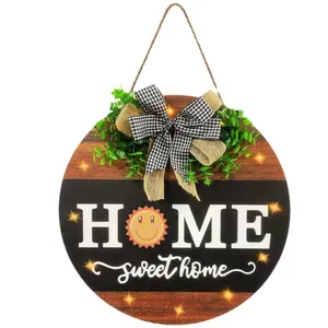 Round wooden LED Home sign with 14 seasonal inserts, greenery and burlap bow decor