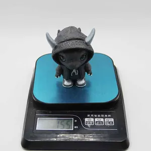 Detailed close-up showing the 155g weight measurement of this black monster ornament
