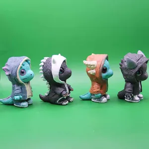 Detail view of four colorful mini monster figurines in trendy hoodies and sneakers