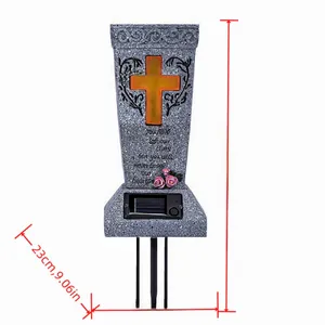 Solar powered memorial garden stake with stone texture cross and rose decoration details