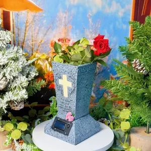 Solar powered memorial vase with cross detail and red roses for cemetery garden decor
