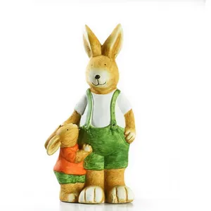 Detail of resin rabbit statues with realistic fur texture and hand-painted clothes