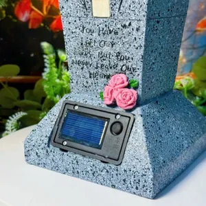 Solar memorial garden cross with pink roses and sentimental engraved message