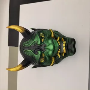 Maschera demone Hannya orientale in verde metallizzato e nero con corna in oro