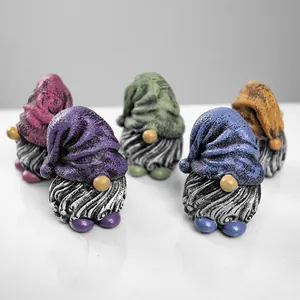Set of five colorful garden gnome resin sculptures for home and lawn decor