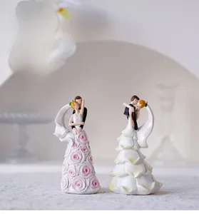 Detail of European resin wedding couple figurines with rose embossing and petal texture