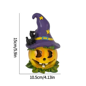 Détail de la figurine de citrouille d'Halloween avec chapeau de sorcier, hauteur 15 cm