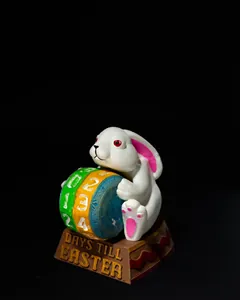 Detail of resin Easter bunny countdown calendar with a colorful rotating number wheel