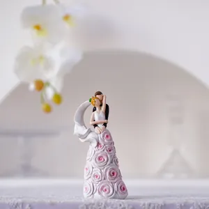 Romantic resin couple figurine with pink rose relief dress for home wedding decor
