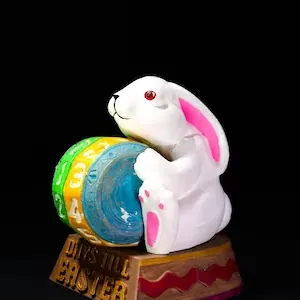 Detail of resin Easter bunny countdown calendar featuring a rotating numbered wheel