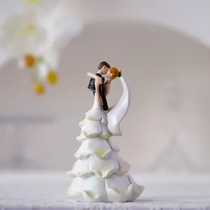 Resin romantic couple figurine for home decor featuring a kissing groom and bride