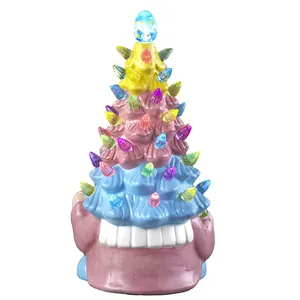 Detailed view of glossy resin gnome tree with colorful light bulbs and egg topper