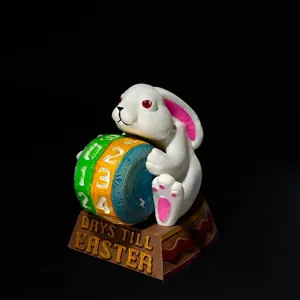 3D printed Easter bunny countdown calendar featuring numbered wheels on a brown base