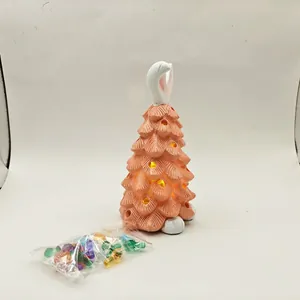 Detail view of light-up bunny ear gnome decoration with colorful insertable plastic pegs