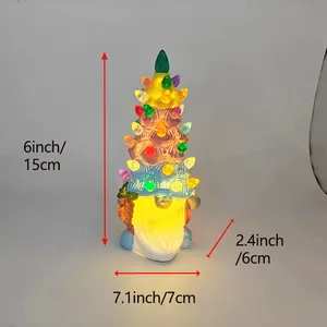 Detail shot of a 15cm light-up Christmas gnome tree with colorful LED beads and warm glow