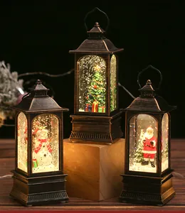 Close-up of three retro bronze lanterns with Santa, snowman and Christmas tree motifs