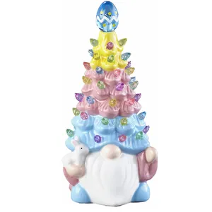 Lighted Easter gnome figurine with colorful macaron hat, holding a bunny rabbit