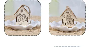 Close-up of wooden Christmas cabin ornaments with engraved bear and reindeer details