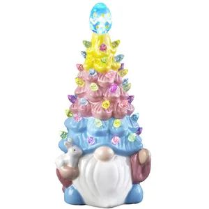 Easter light-up ceramic gnome with colorful tree hat and small bunny figurine decor