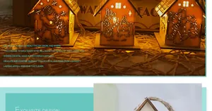 Close-up of wooden LED Christmas house ornament with warm light and festive carvings
